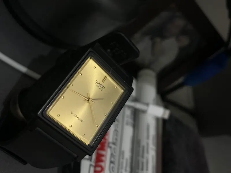 image by Hendra Sadewa, a casio watch in the tank shape showing time 13.44